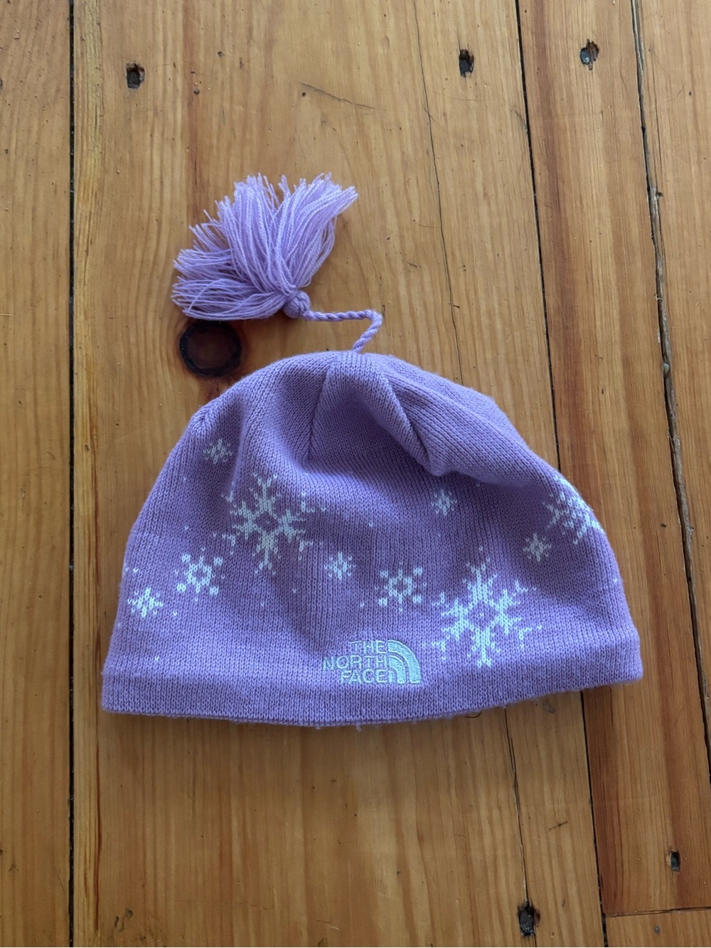 The North Face Purple Snowflake Fleece Lined Tassel Beanie Hat Girls